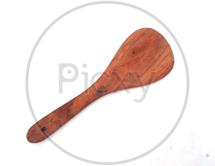some wooden spatula isolated on white background