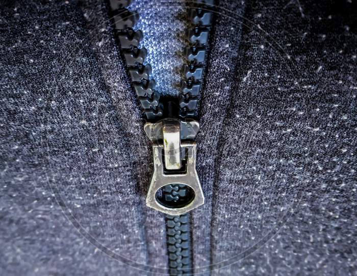 Close Up Shot Of Zip Of Woolen Jacket