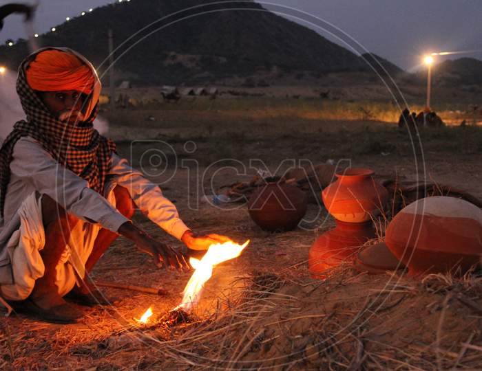 Camel Traders making Camp Fire At Pushkar Camel Fair, Pushkar