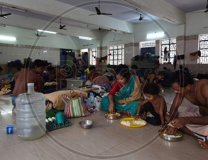 Migrant Workers Eat At Their Camp During A Government-Imposed Nationwide Lockdown As A Preventive Measure Against The Covid-19 Coronavirus, In Chennai.