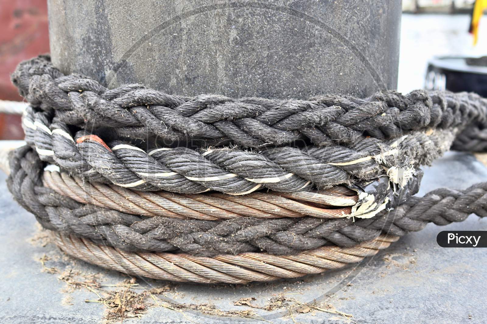 Detailed close up detail of ropes and cordage in the rigging of an old wooden vintage sailboat