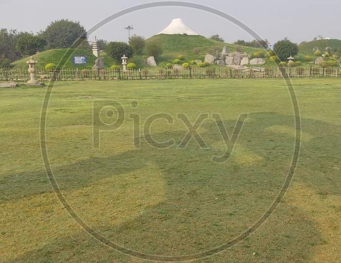 Indraprastha Park is a Large public green space with a playground, amphitheater & Buddhist stupa dedicated to world peace.