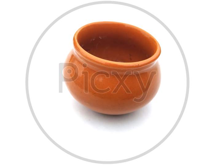 a brown color clay pot isolated on white background
