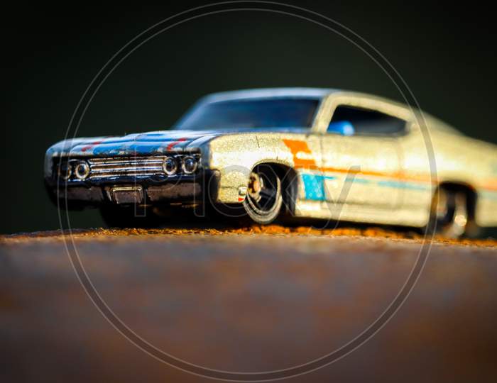 a model car on the muddy road