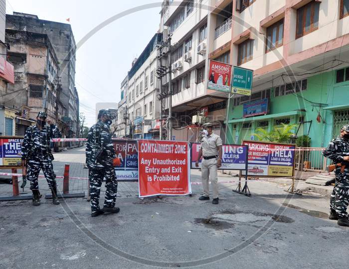 Security Personnel Stand at Containment Zone Area At Fancy bazar which Sealed After 16 People Were Tested Positive For Coronavirus, During Nationwide Lockdown Amidst Coronavirus or COVID-19 Pandemic  In Guwahati,India