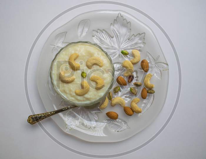Top View Of Indian Dessert Kheer/Khir (Rice Pudding) Made From Condensed Milk, Rice, Sugar And Dry Fruits