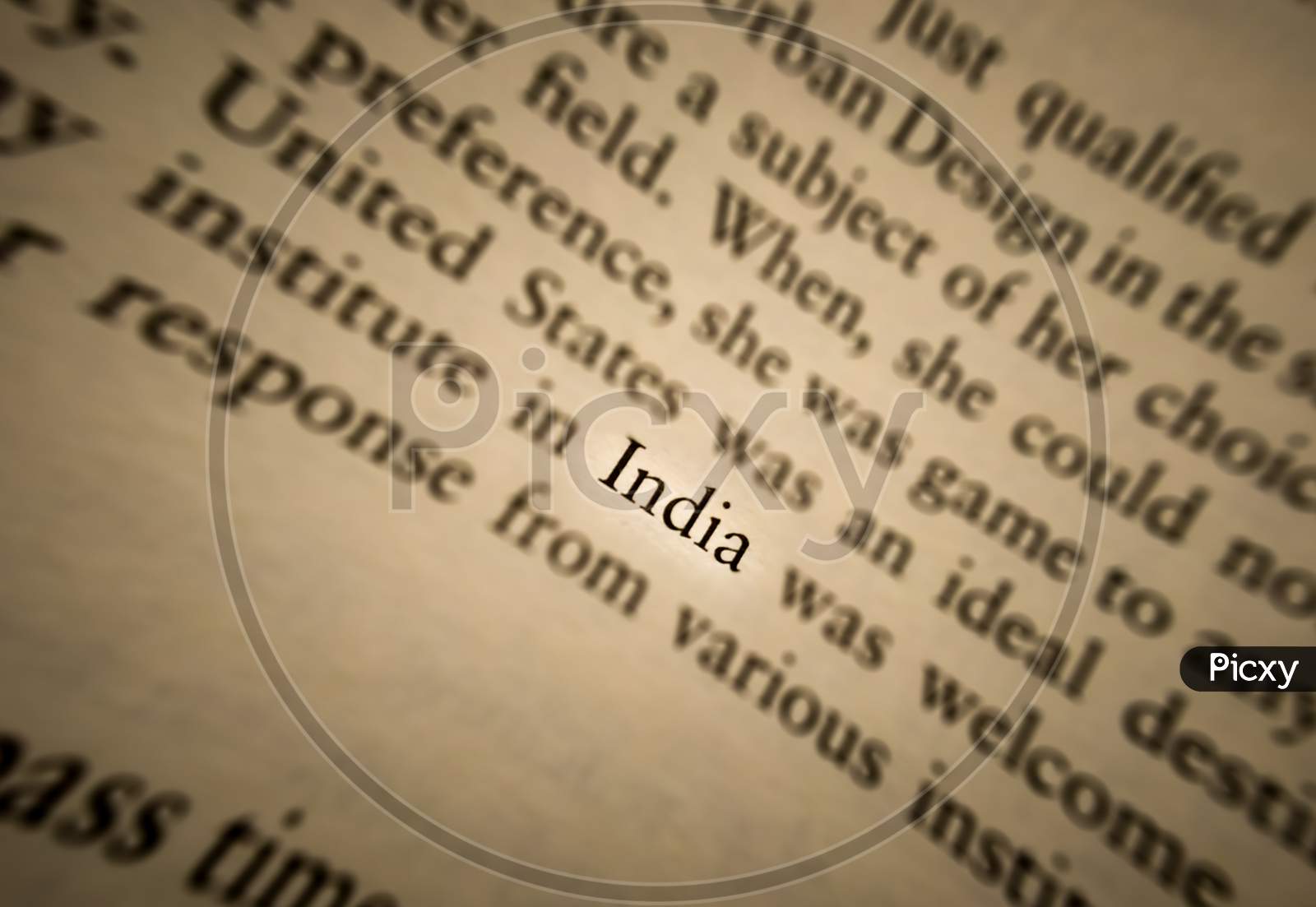 India Word Highlighted And Focused In An Old Book.