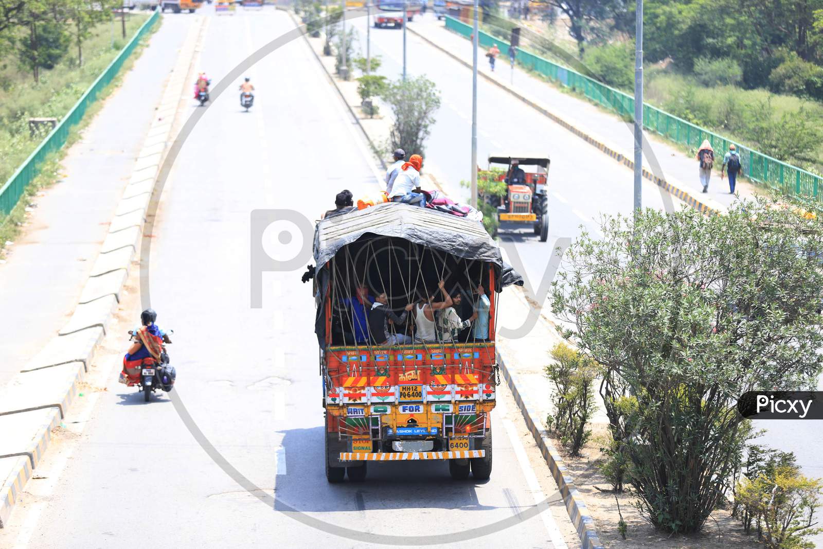 Migrants From Mumbai Travelling in Trucks To their Native Places During Extended Nationwide Lockdown Amidst Coronavirus Or COVID-19 Pandemic in Prayagraj