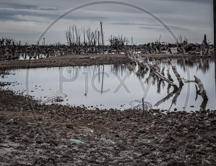 Flooded City Of Epecuen In Buenos Aires, Argentina. Ruins In The Abandoned Village. Dead Trees And Flooded Areas In The Destroyed City.