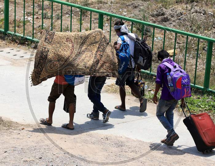 Migrants From Mumbai Walking To Their Native Places  During Extended Nationwide Lockdown Amidst Coronavirus Or COVID-19 Pandemic in Prayagraj