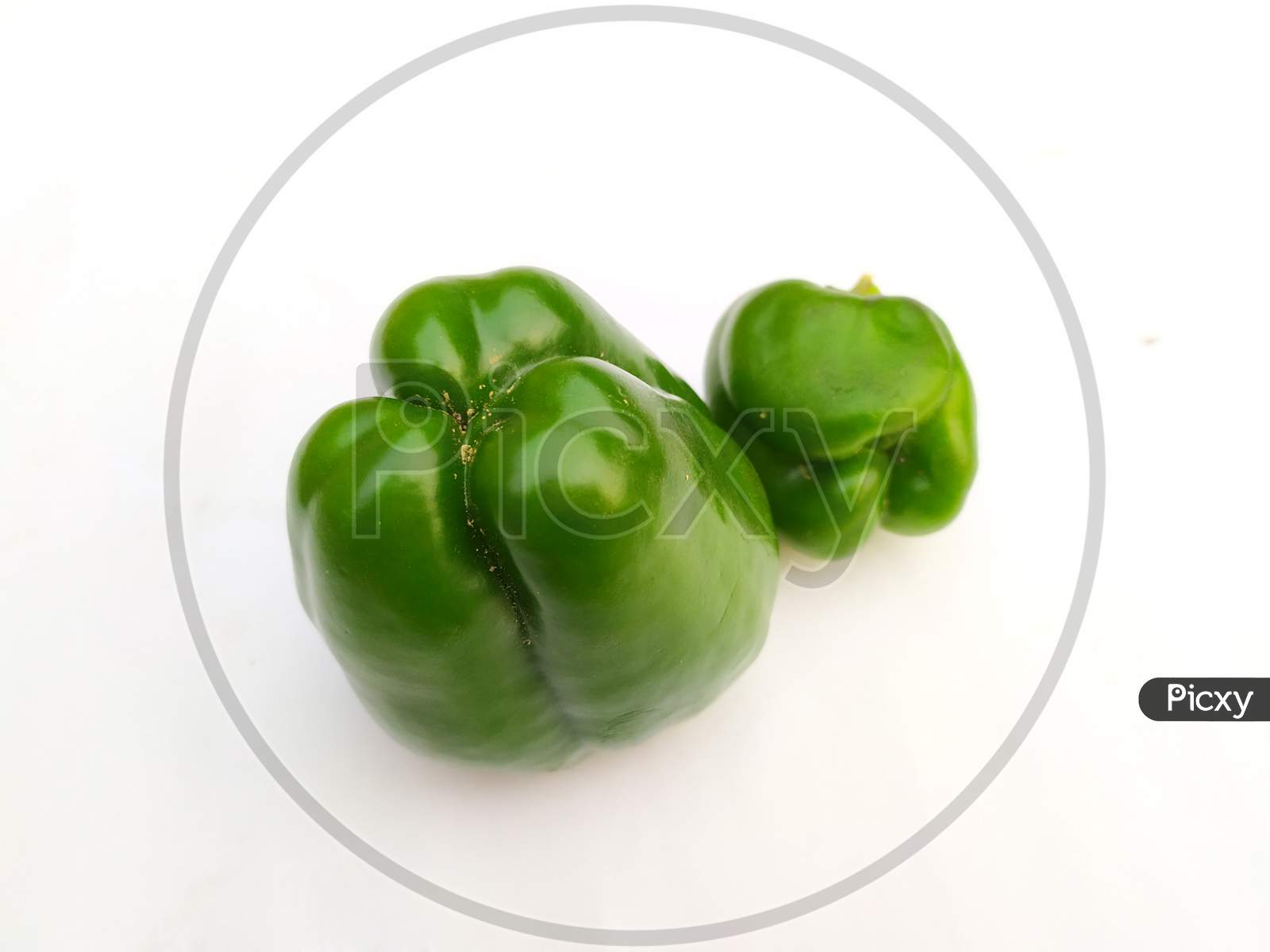 fresh green bell pepper (capsicum)isolated on white background