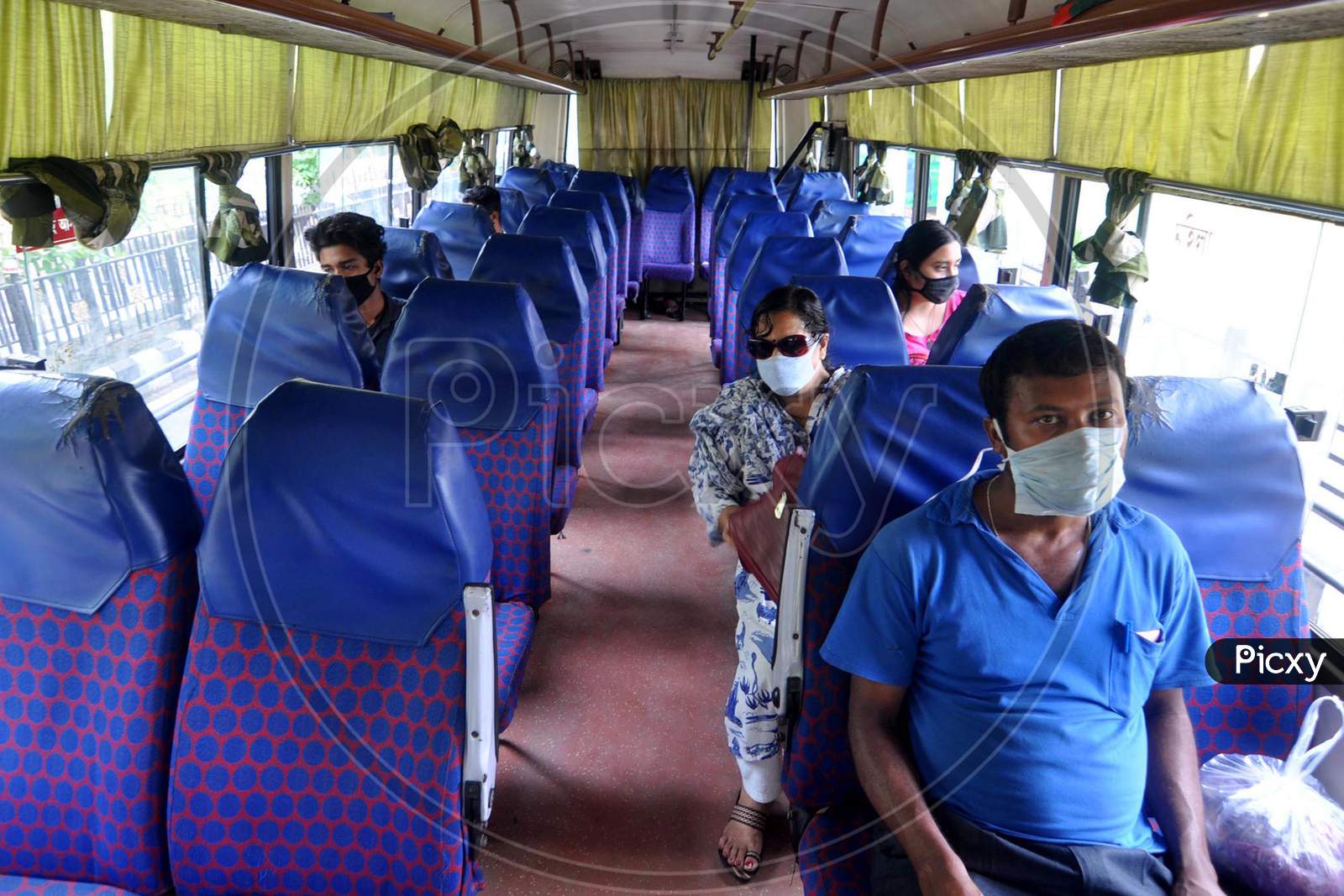 People Maintain Social Distance As They Travel In A City Bus After Authorities Eased Restrictions, During Nationwide Lockdown Amidst Coronavirus or COVID-19 Pandemic  In Guwahati District Of Assam,India