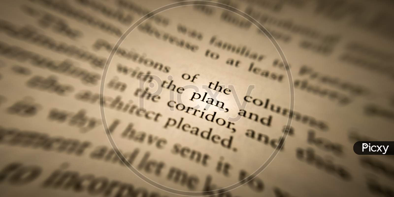 Plan Word Highlighted And Focused In An Old Book.