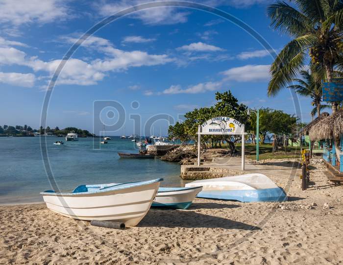 Boats at rest on a Caribbean beach.