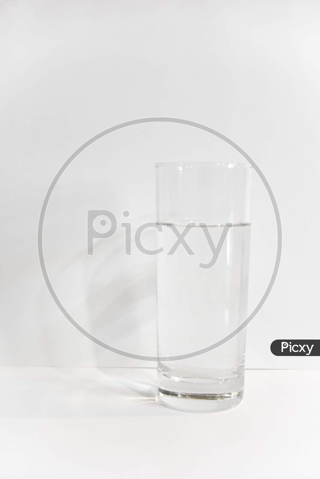 Simple Glass Of Water On The White Background