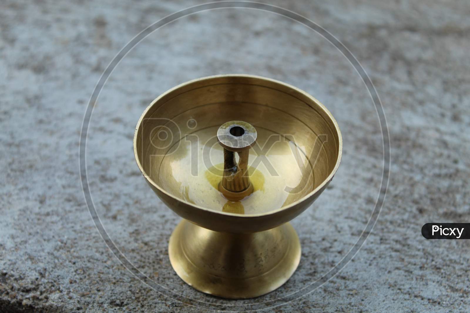 Brass Oil Lamp Is Made Up Of Brass.