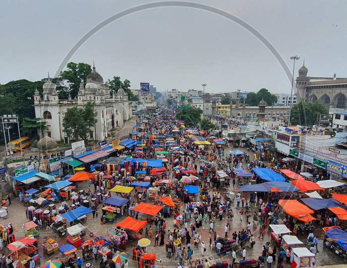 Top view of busy street market next to Charminar