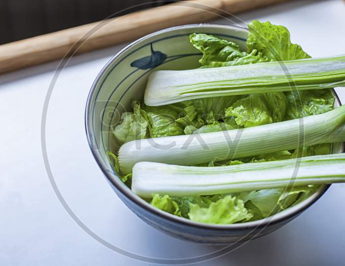 Green Onion And Lettuce In A Bowl