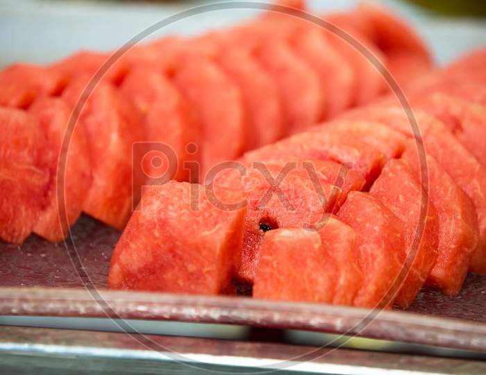 Slices Of Red Delicious Watermelon In A Tray, Background