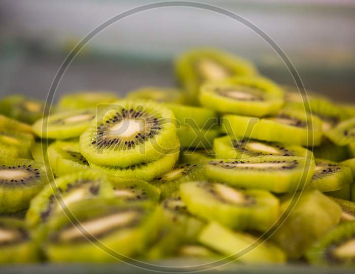 Pile Of Sliced Healthy Green Kiwi Fruit