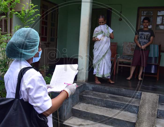 Health Worker Conducting  House To House Health Survey  During Nationwide Lockdown Amidst Coronavirus or COVID-19 Pandemic  In Nagaon District Of Assam,India