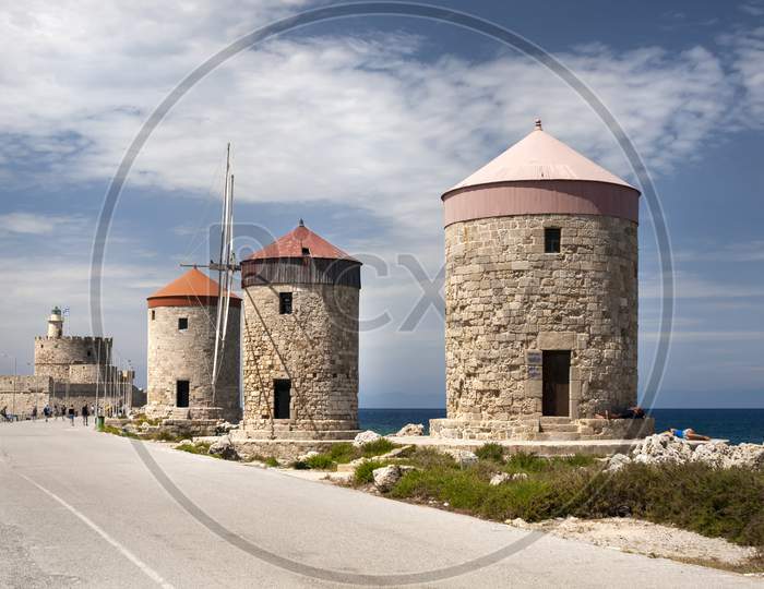 The three Windmills of Mandraki Harbour in Rhodes