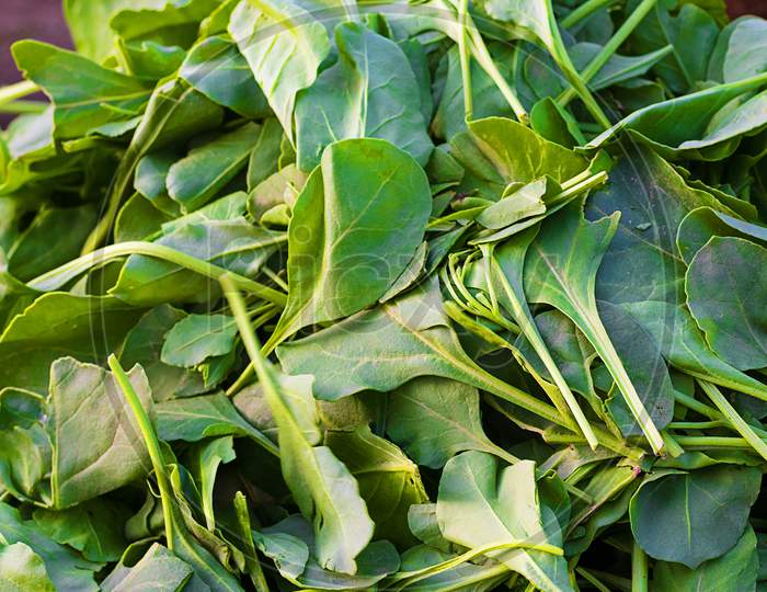 Spinach Green And Fresh Leaves In The Market, Agriculture And Food Concept, Background