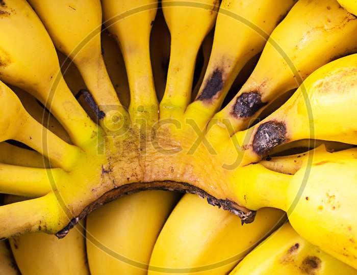 Pile Of Rip Yellow organic Banana