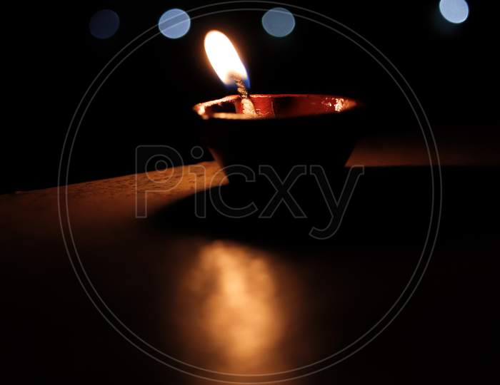 Oil lamp picture in background blur