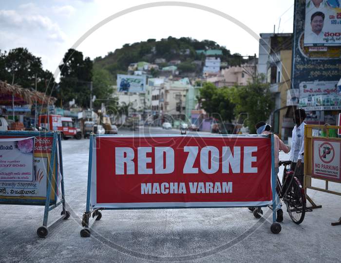 A Road Is Blocked With The Barricades At A Covid-19 Contaminated Zone During The Nationwide Lockdown Amid Coronavirus Pandemic In Vijayawada.