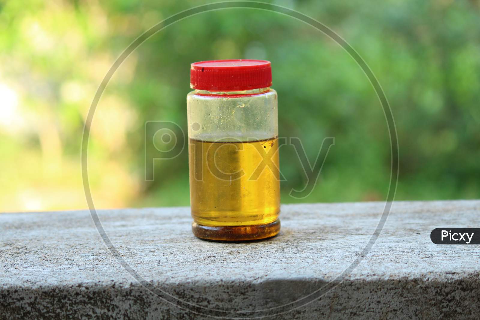 Cooking Oil Stored In A Transparent Glass Bottle