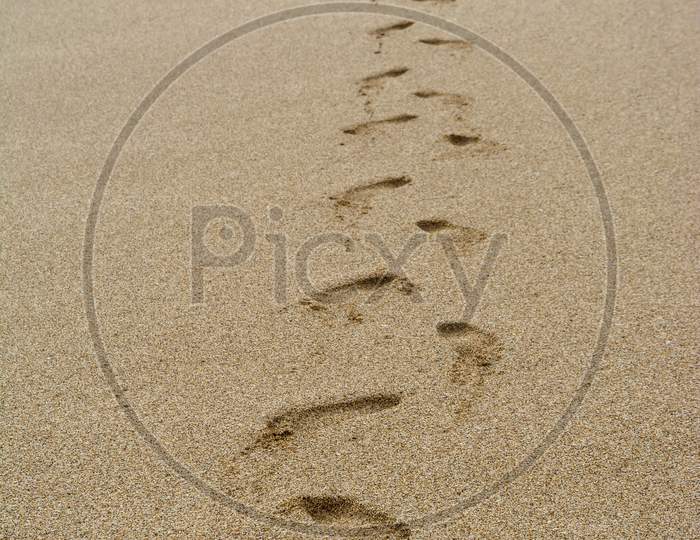 foot marks in sand of Sea beach of dwarkadhish temple of somenath Gujarat India