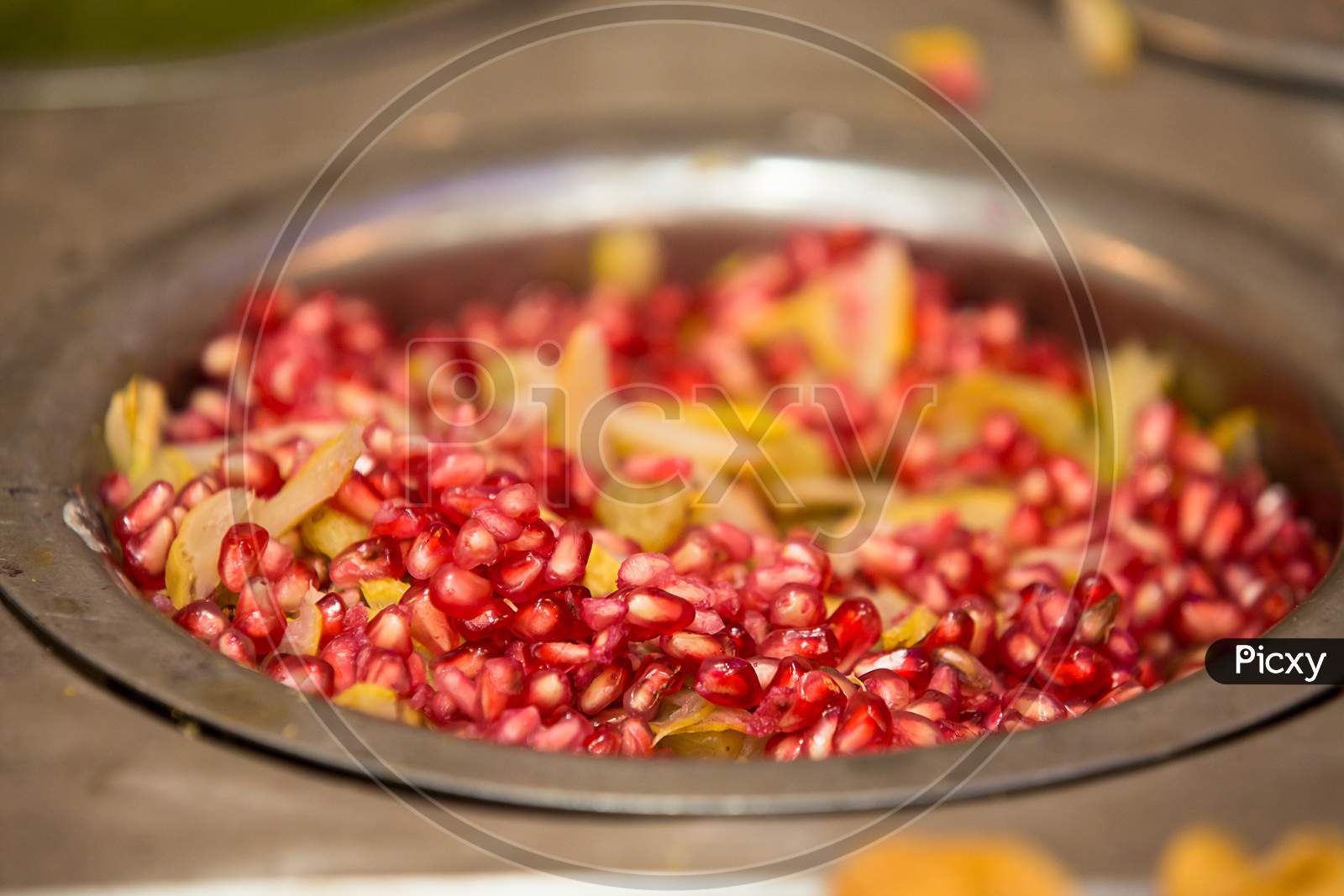 Pomegranate Seeds In Bowl,Healthy Fruit, Background