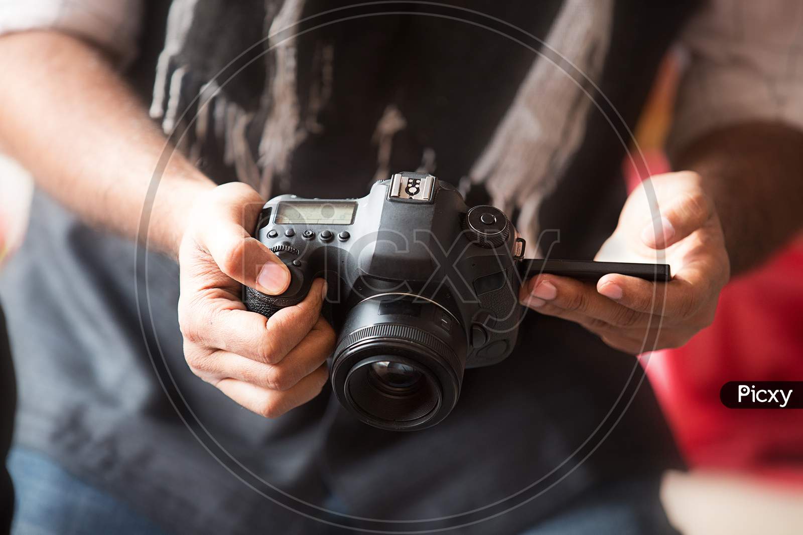 Closeup Of Man Hand Holding Dslr Camera And Taking Photo, Selective Focus - Image