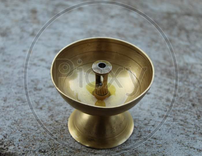 Brass Oil Lamp Is Made Up Of Brass.