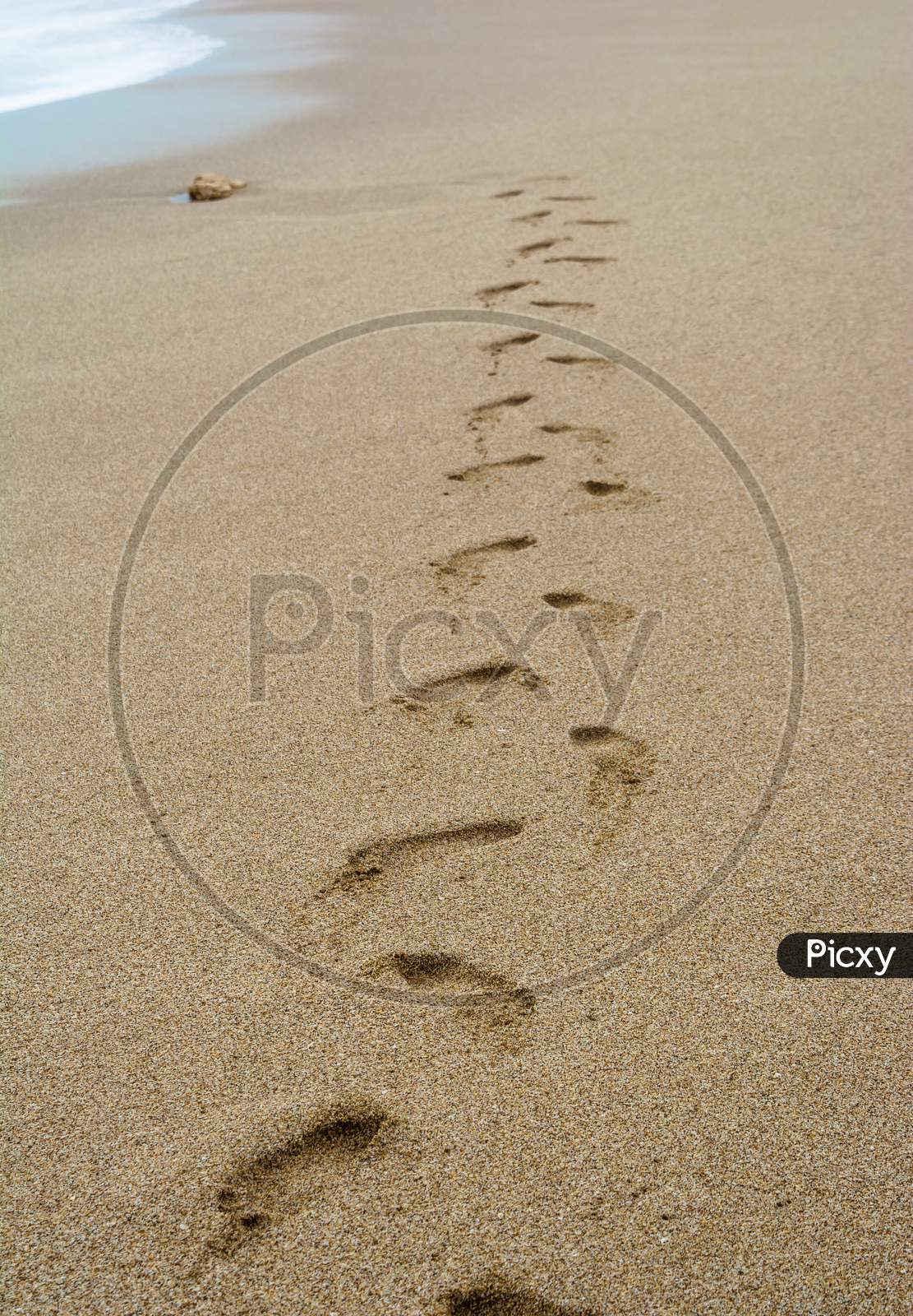 foot marks in sand of Sea beach of dwarkadhish temple of somenath Gujarat India