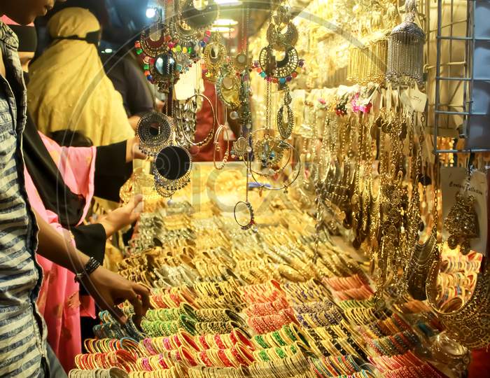 Colourful handmade beautiful and stylish bangles & earrings for sale at outside street market