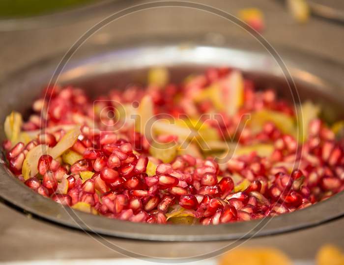 Pomegranate Seeds In Bowl,Healthy Fruit, Background