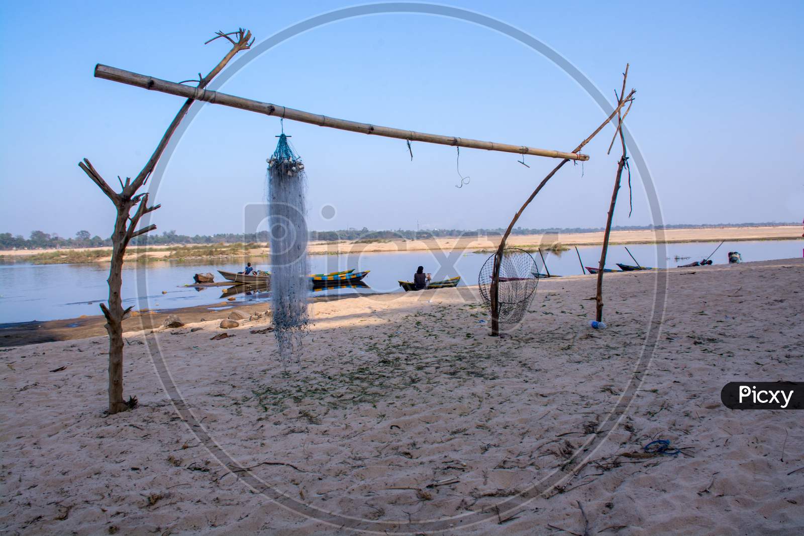 hanfging fishing net boats and damodar river near bardhaman west bengal