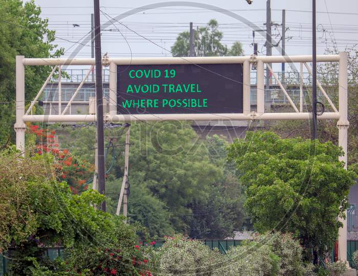 "Newdelhi/India-13/05/2020: Highway Road Signs Roads Boards Delhi Coivd 19 Avoid Travel Were Possible"