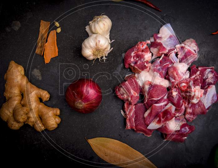 Chopped raw meat on black background , top view . raw Lamb and mutton meat isolated.