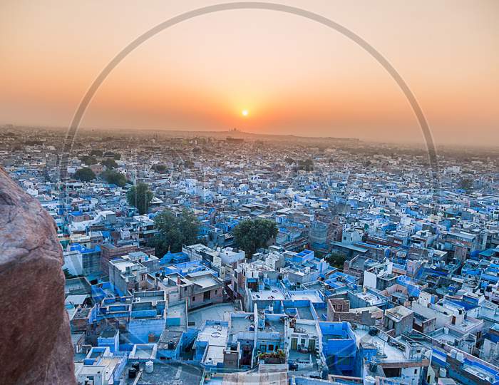 Aerial View Of Blue City Houses With Golden Sunrise In The Backgrod From, Mehrangarh Fort, Jodphur, Rajasthan Tourism - Image