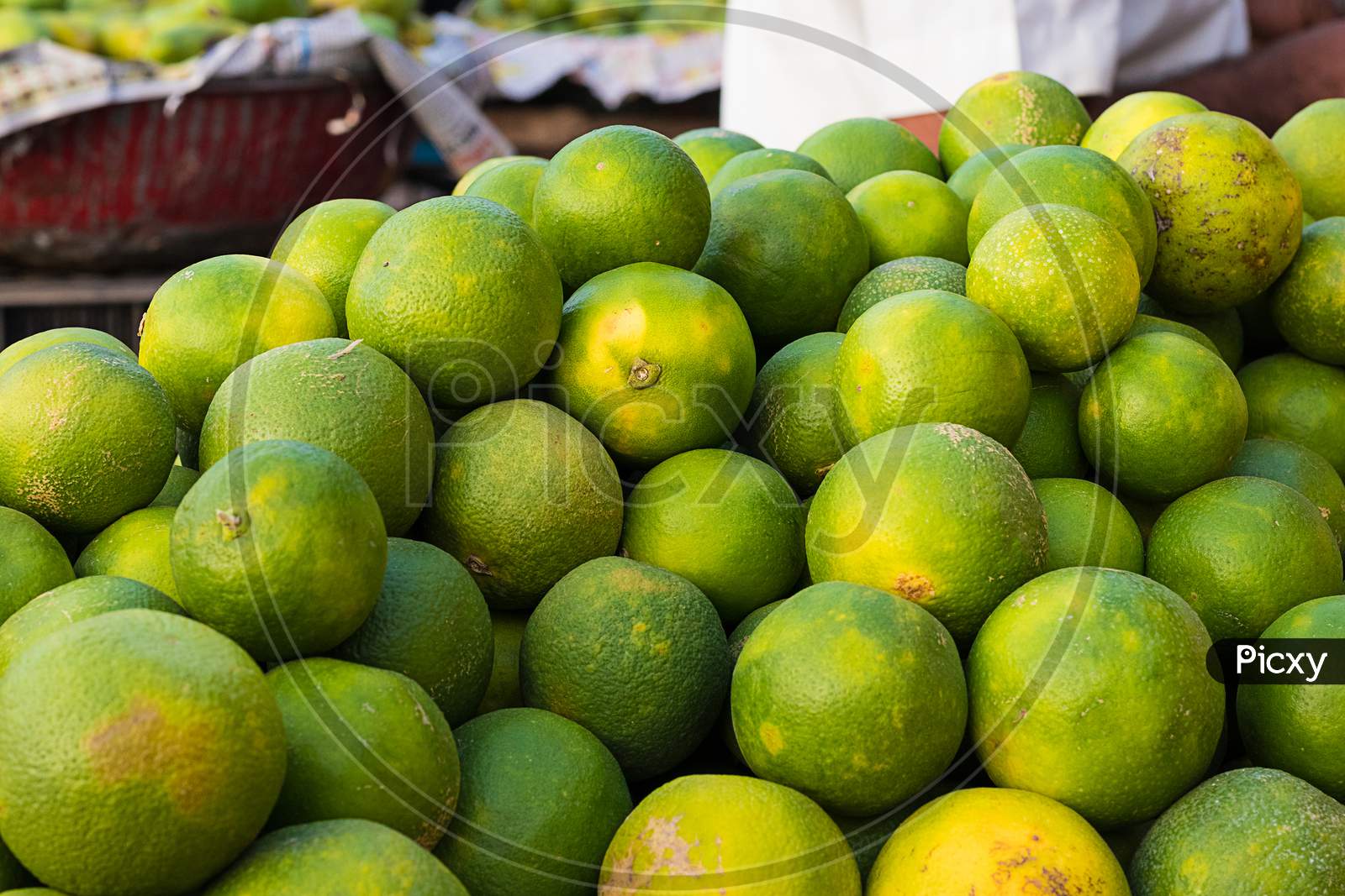 Pile Of Organic Rip Sweet Lime In Market