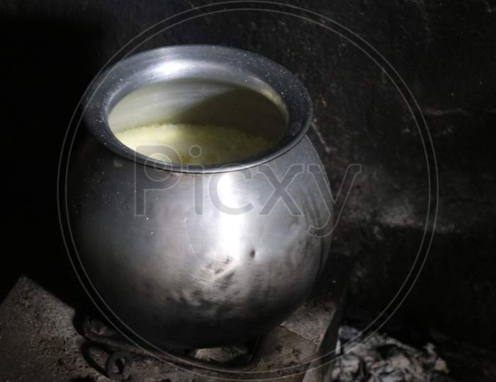 Vessel With Milk Kept In Firewood Stove Which Is Very Old Fashion Of Cooking In Villages