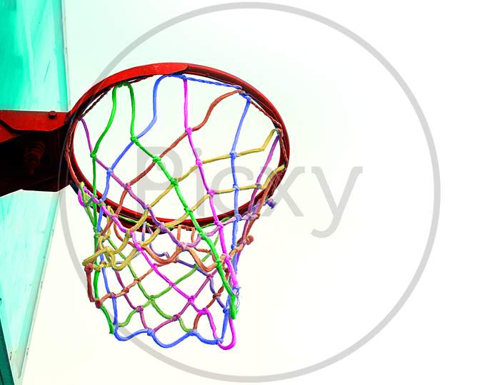 Colorful Basketball Hoop Against White Background, Sports Concept - Image