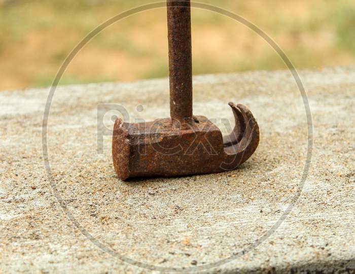 A Claw Hammer Rested On Its Head