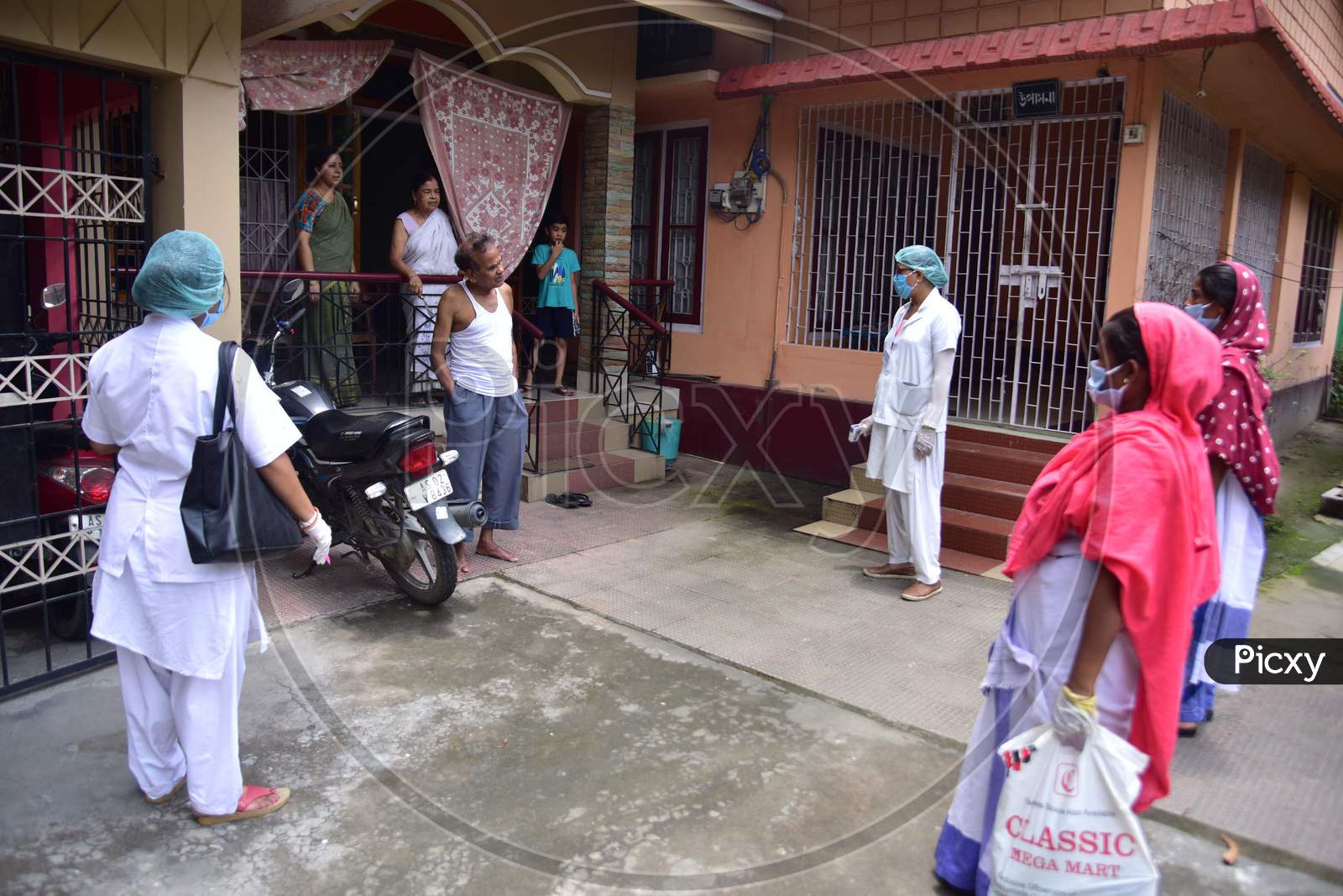 Health Workers Team  Conducting  House To House Health Survey  During Nationwide Lockdown Amidst Coronavirus or COVID-19 Pandemic  In Nagaon District Of Assam,India