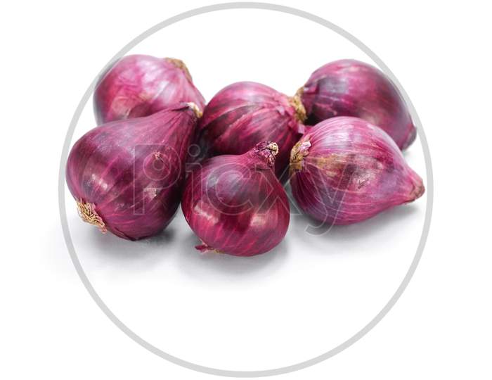 Red whole onions isolated on white background