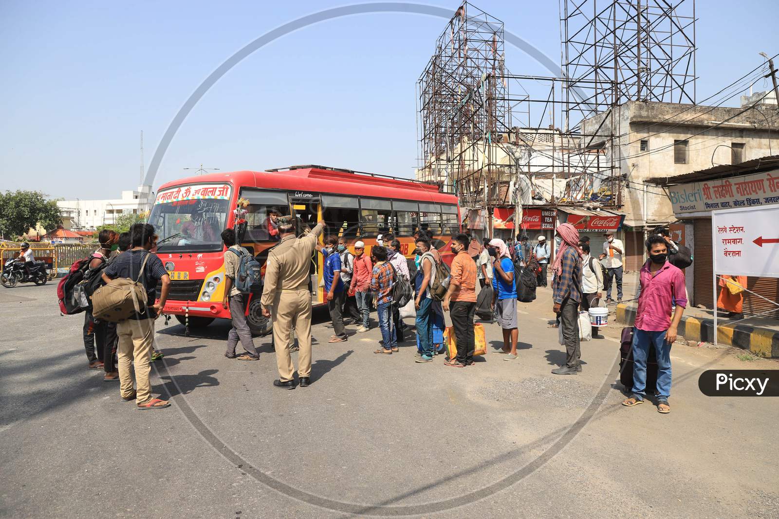 Migrant Workers Boarding Buses To Their Native Places During Extended Nationwide Lockdown Amidst Coronavirus Or COVID-19 Pandemic in Prayagraj