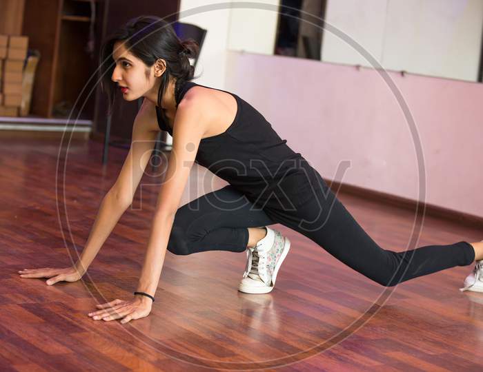 Beautiful Slim Girl Exercising At Gym Health And Fitness Concept